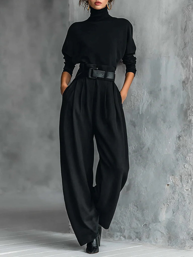 Emma | Completo nero a due pezzi con maglia a collo alto a maniche lunghe e pantaloni dritti (cintura inclusa)